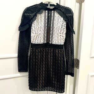 Self portrait dress- worn one time . Perfect condition. Size 4 black and white